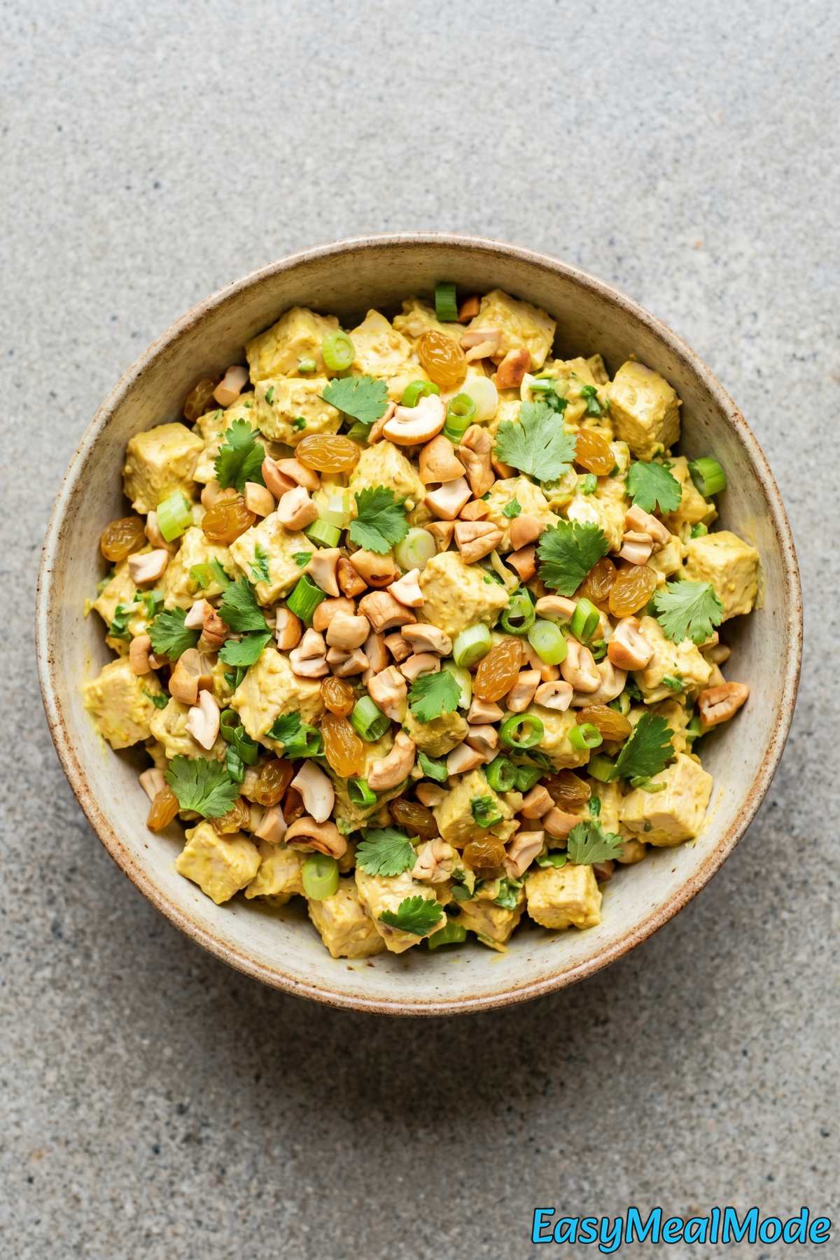 Light chicken salad with curry and cashews