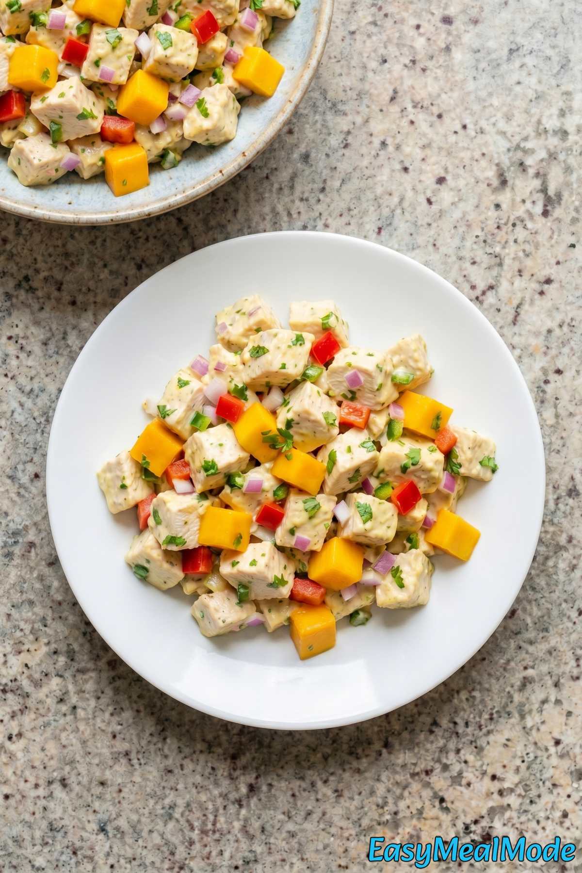 Colorful chicken salad with mango cilantro lime