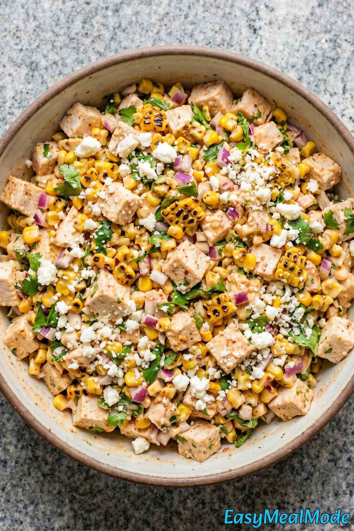 Colorful chicken salad with street corn & chipotle