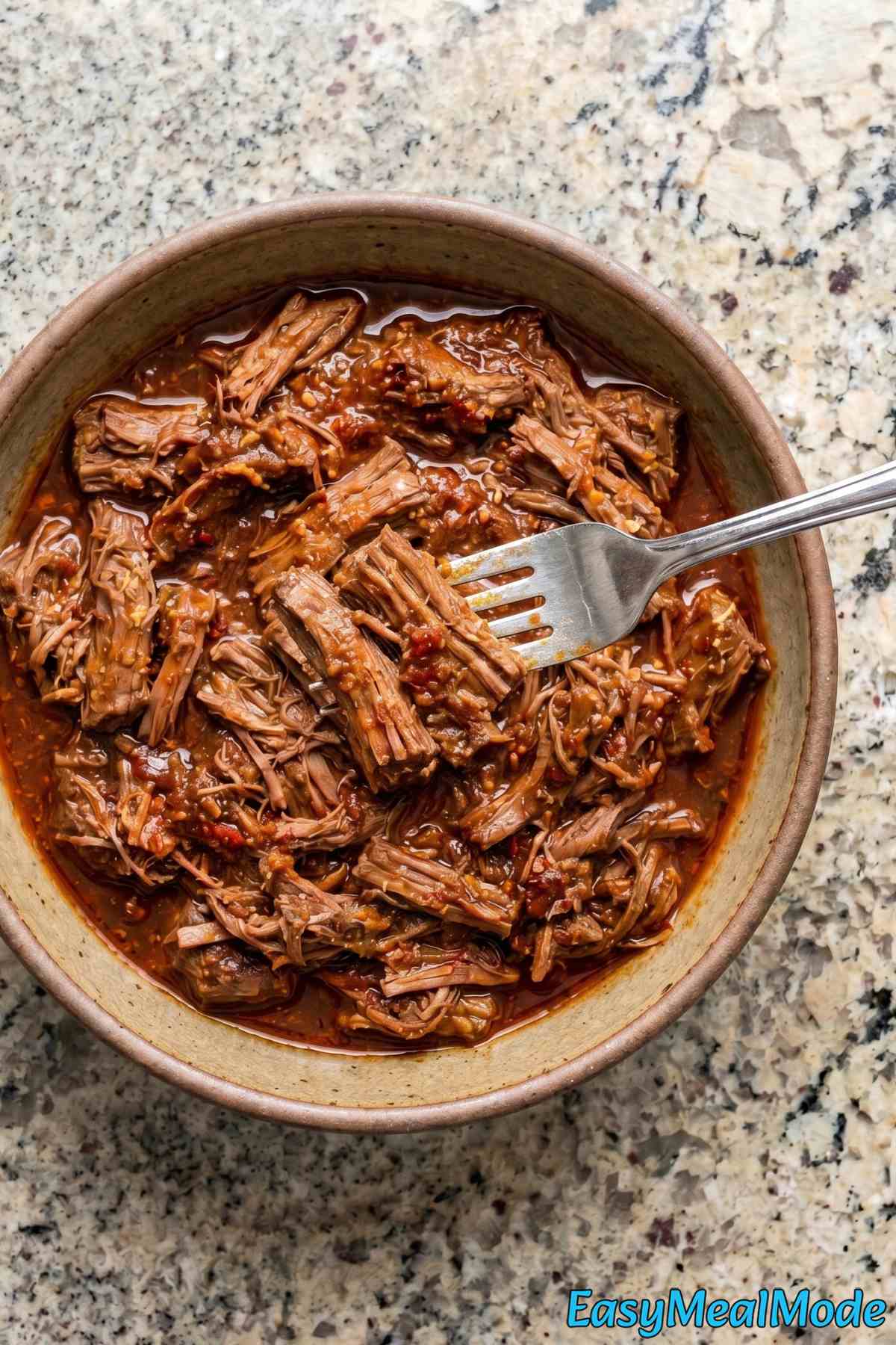 Hearty slow cooker barbacoa beef plated