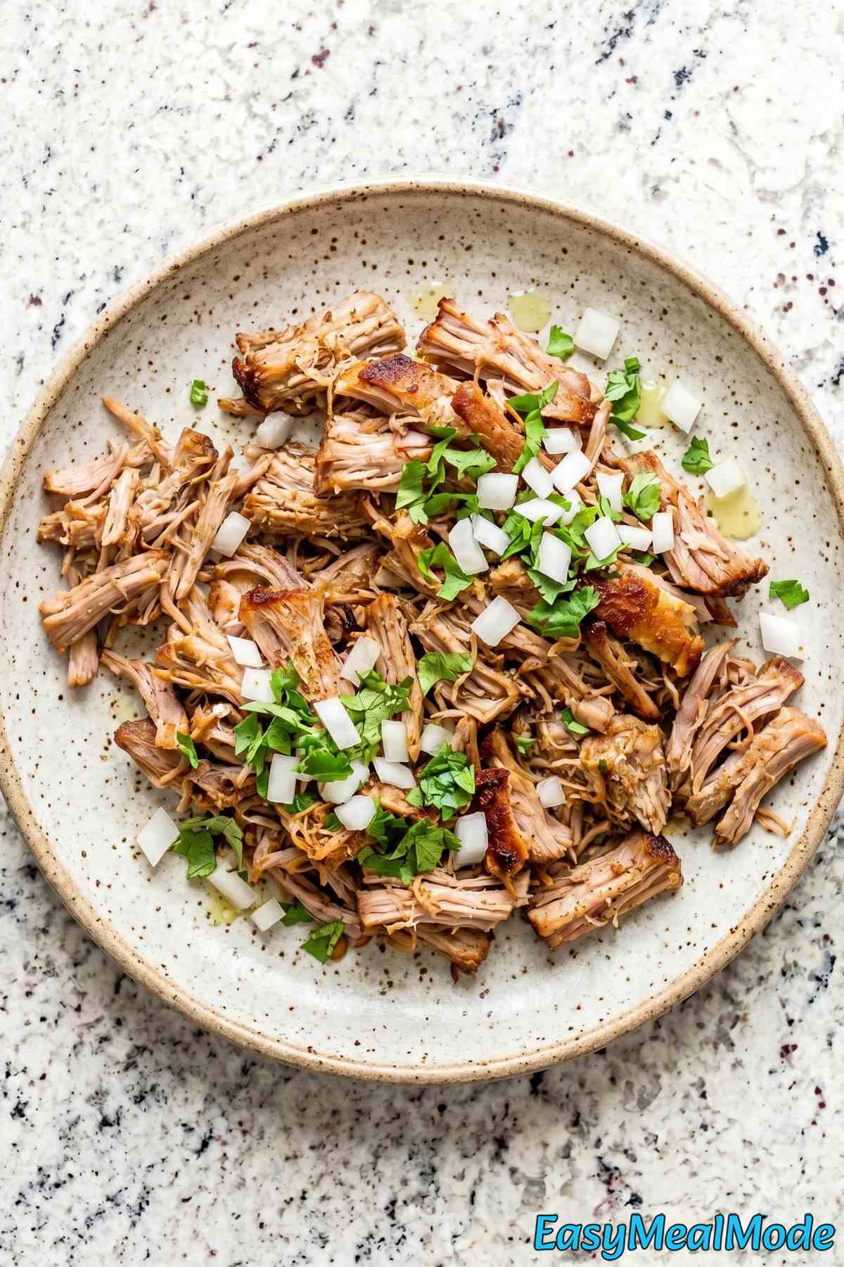 Mouthwatering slow cooker carnitas shredded